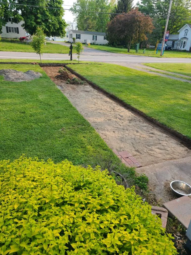 Brick path installation project completed by Diamond Landscape & Design.
