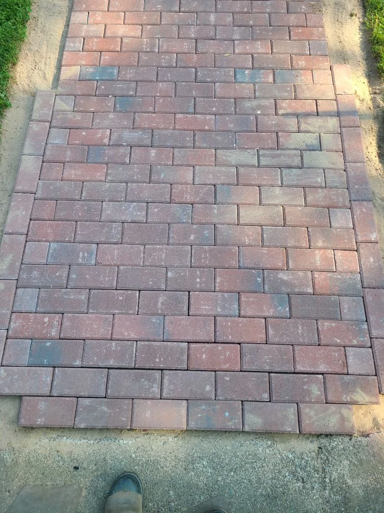 Brick path installation project completed by Diamond Landscape & Design.