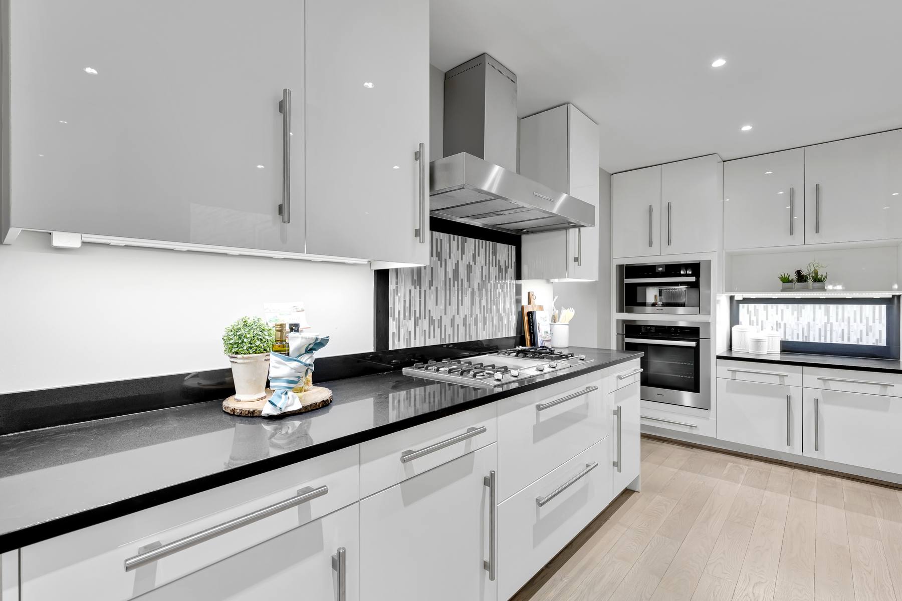 Kalorama Co-Op sleek kitchen design with marble countertops and contemporary fixtures