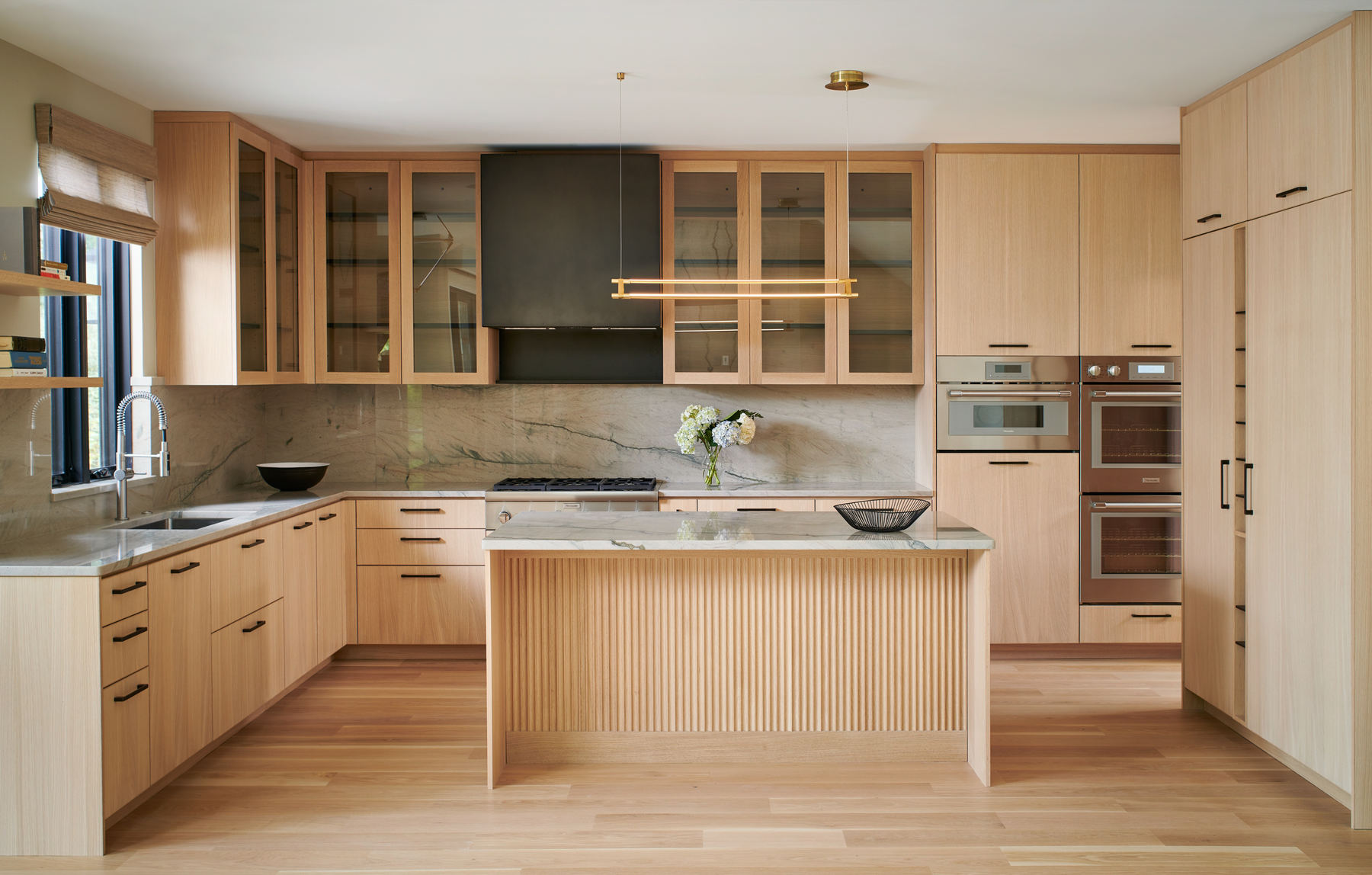 Western Avenue kitchen renovation with contemporary design, custom lighting, and premium appliances