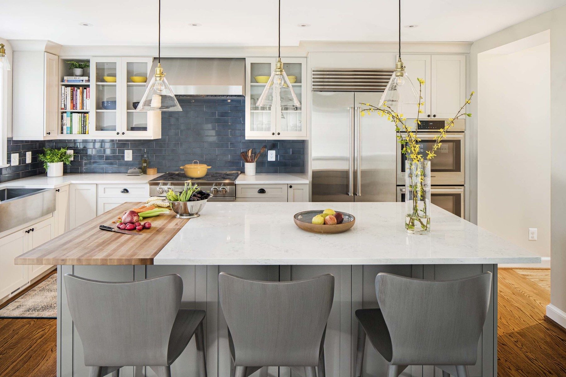 Takoma Park kitchen in three-story addition with bright, airy space and custom features