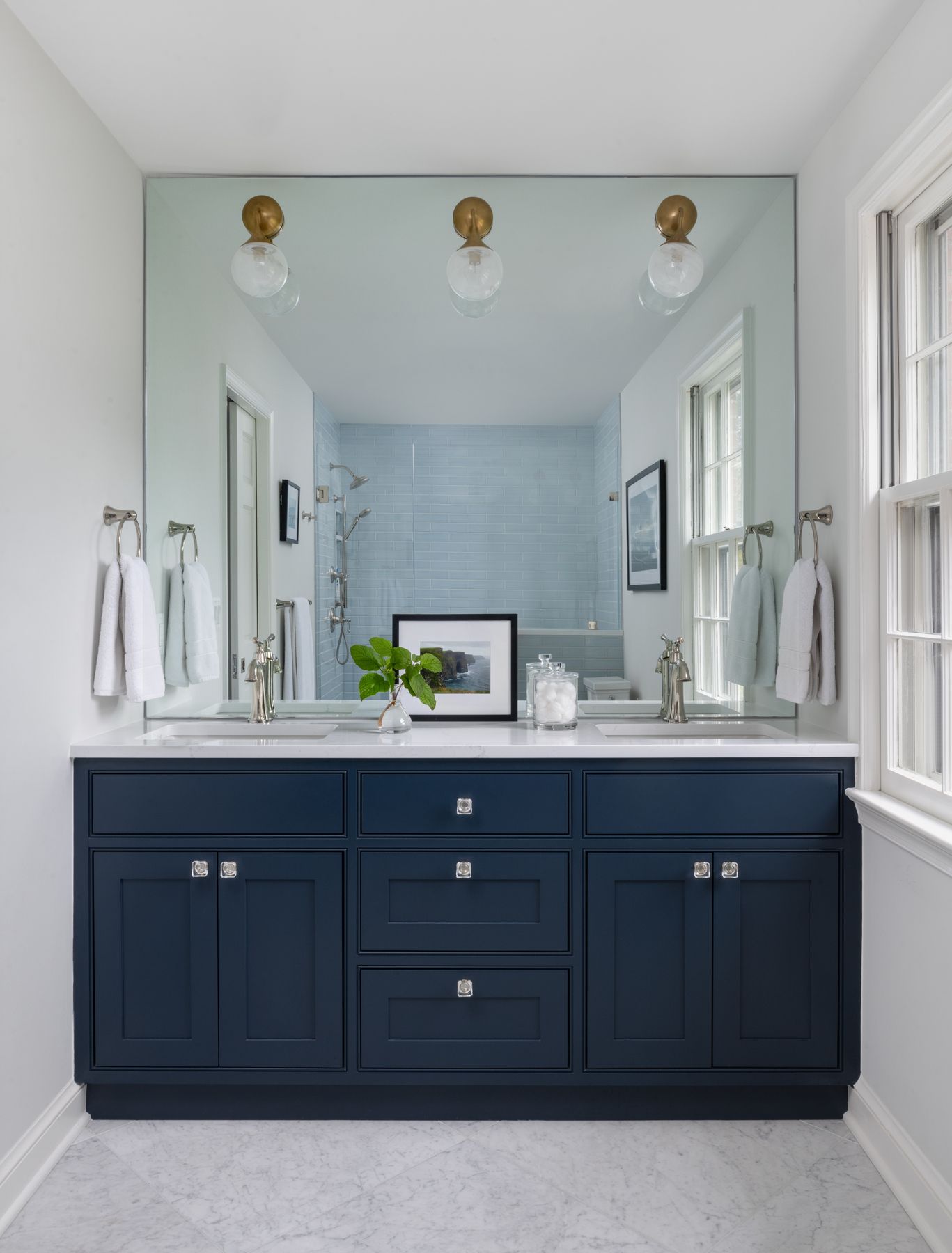 Spring Valley bathroom featuring walk-in glass shower and custom tilework