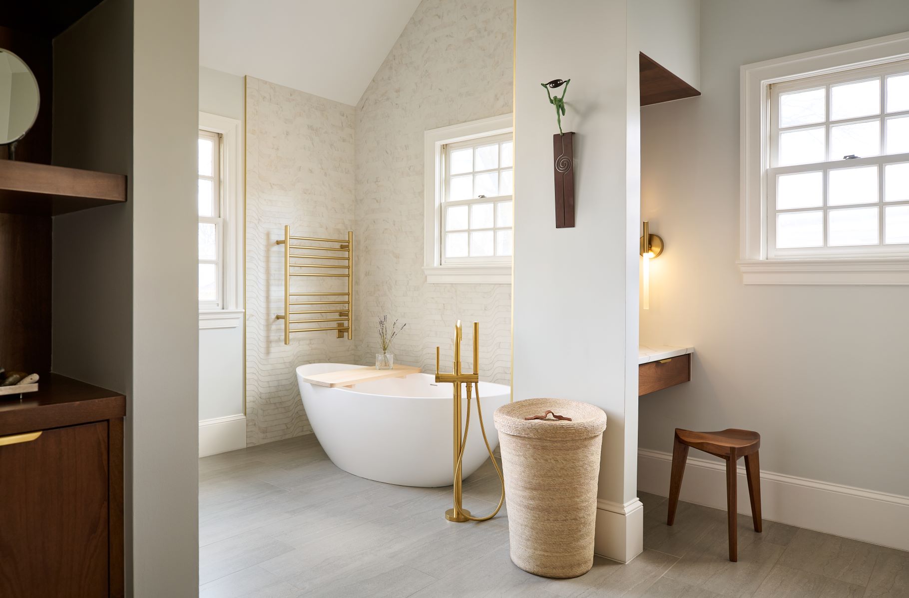 Modern bathroom renovation with elegant tile work and custom vanity