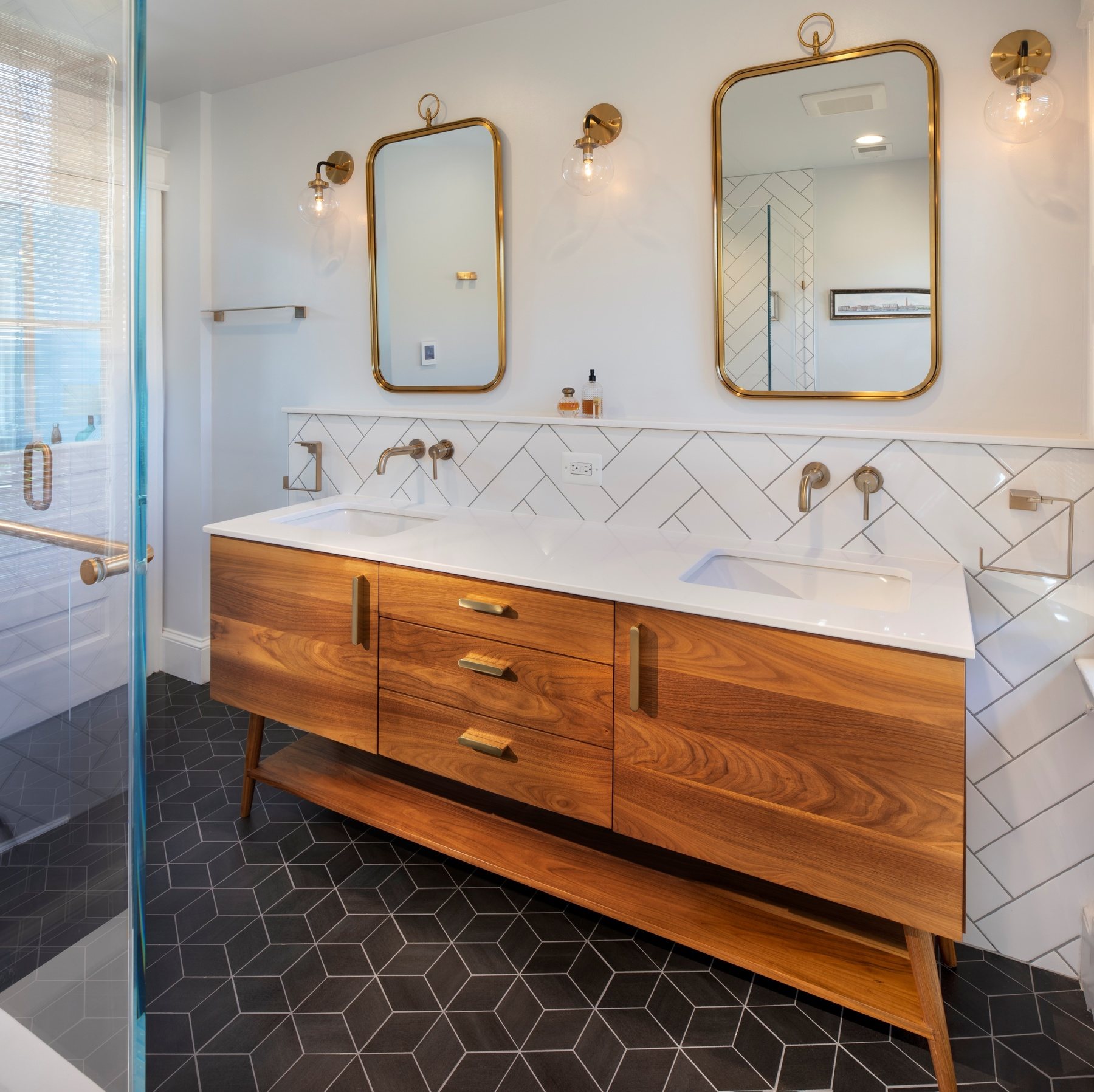Mid-Century inspired bathroom featuring distinctive tile pattern and vintage fixtures