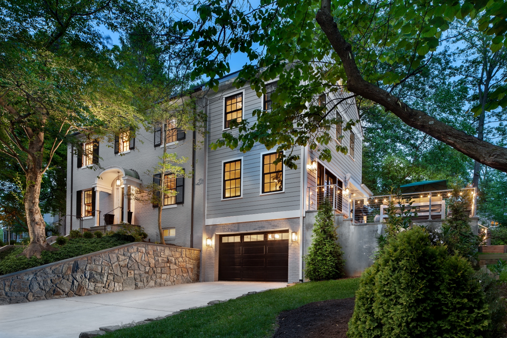 Surrey home exterior at twilight with elegant lighting and architectural presence