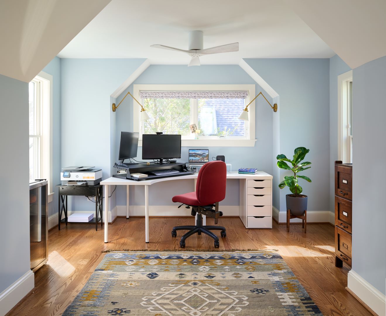 Entryway view showing connection to renovated interior spaces with consistent design elements