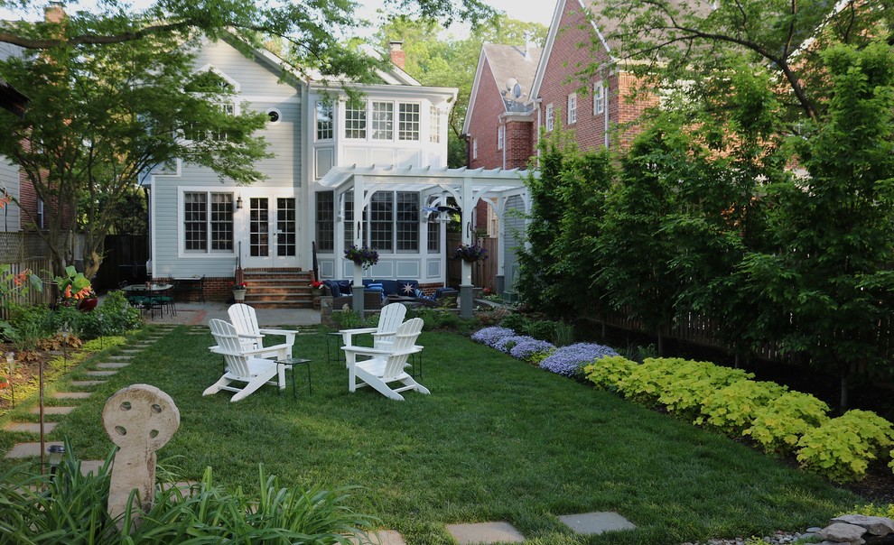 Eco-friendly backyard raingarden featuring native plants that allow rainwater to permeate within the site