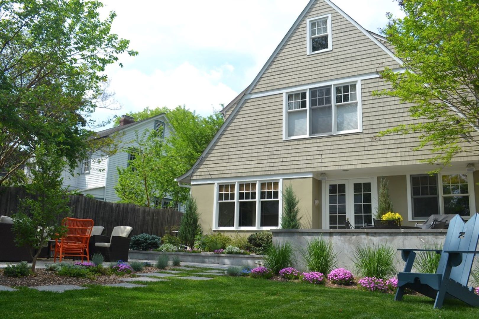 View of shed backing the sunken living room area with integrated seating elements
