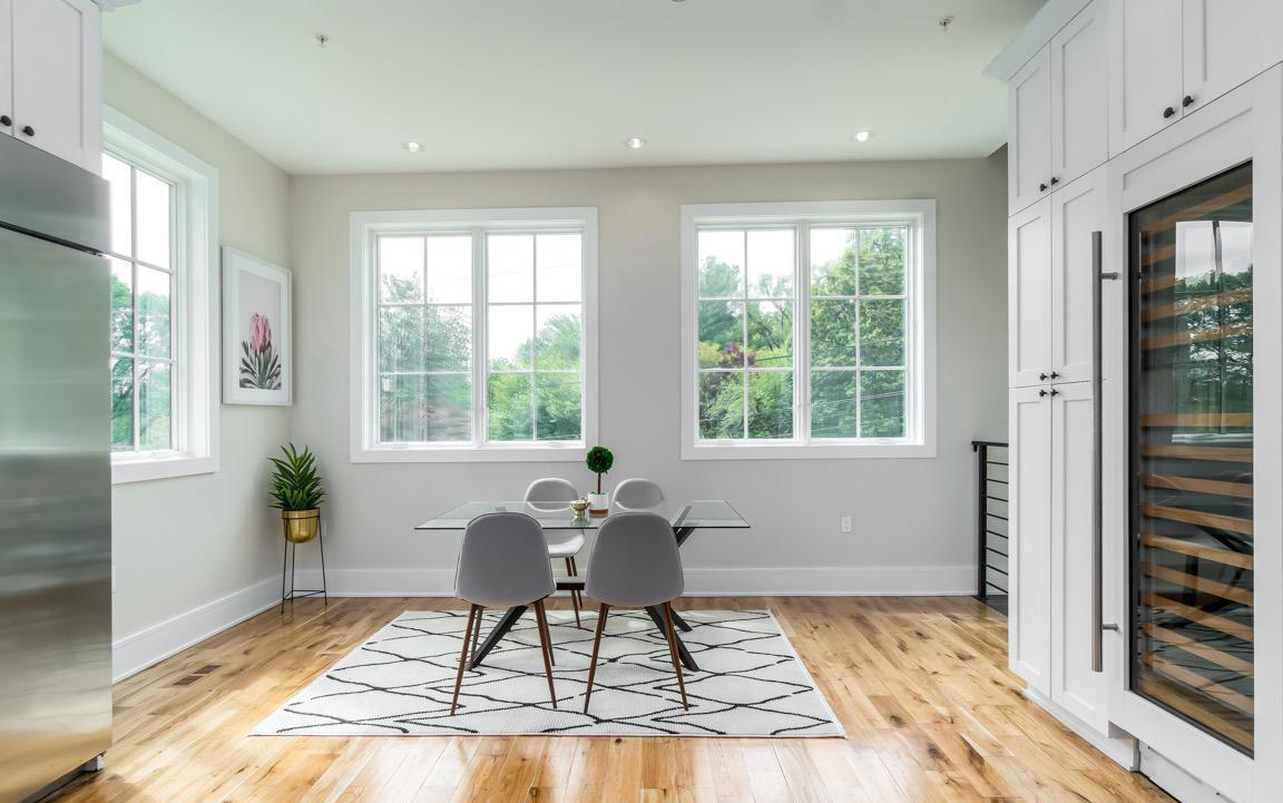 Custom millwork featuring integrated lighting, clean lines, and minimalist design