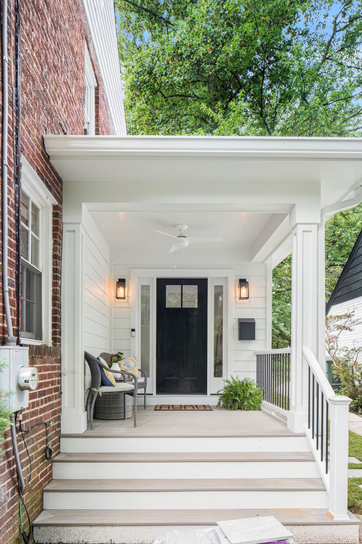 Elegant exterior of renovated Chevy Chase home featuring new addition with transitional architectural elements and refined details