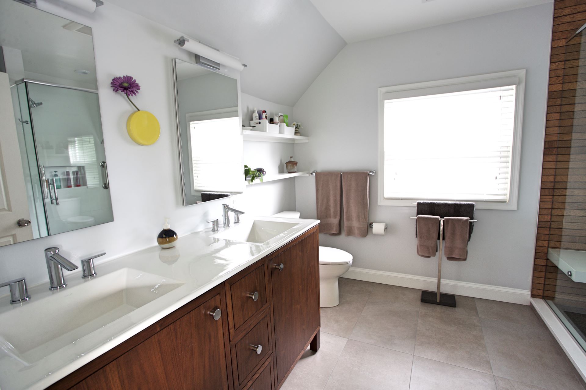Modern bathroom with clean lines, minimalist fixtures, and mid-century inspired design elements in Silver Spring home