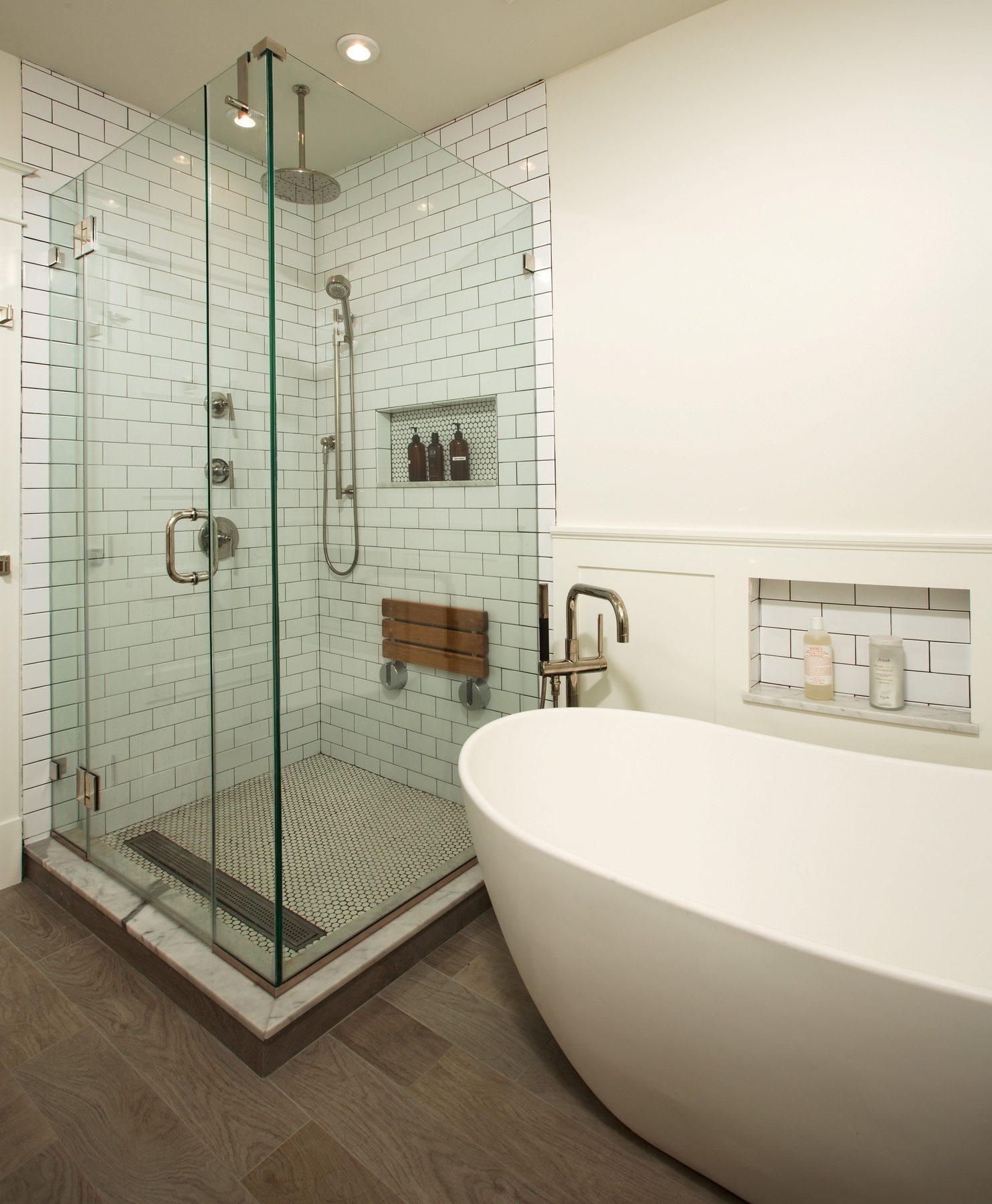 Detail of bathroom fixtures showing brass elements and period-appropriate selections consistent with 1900s home