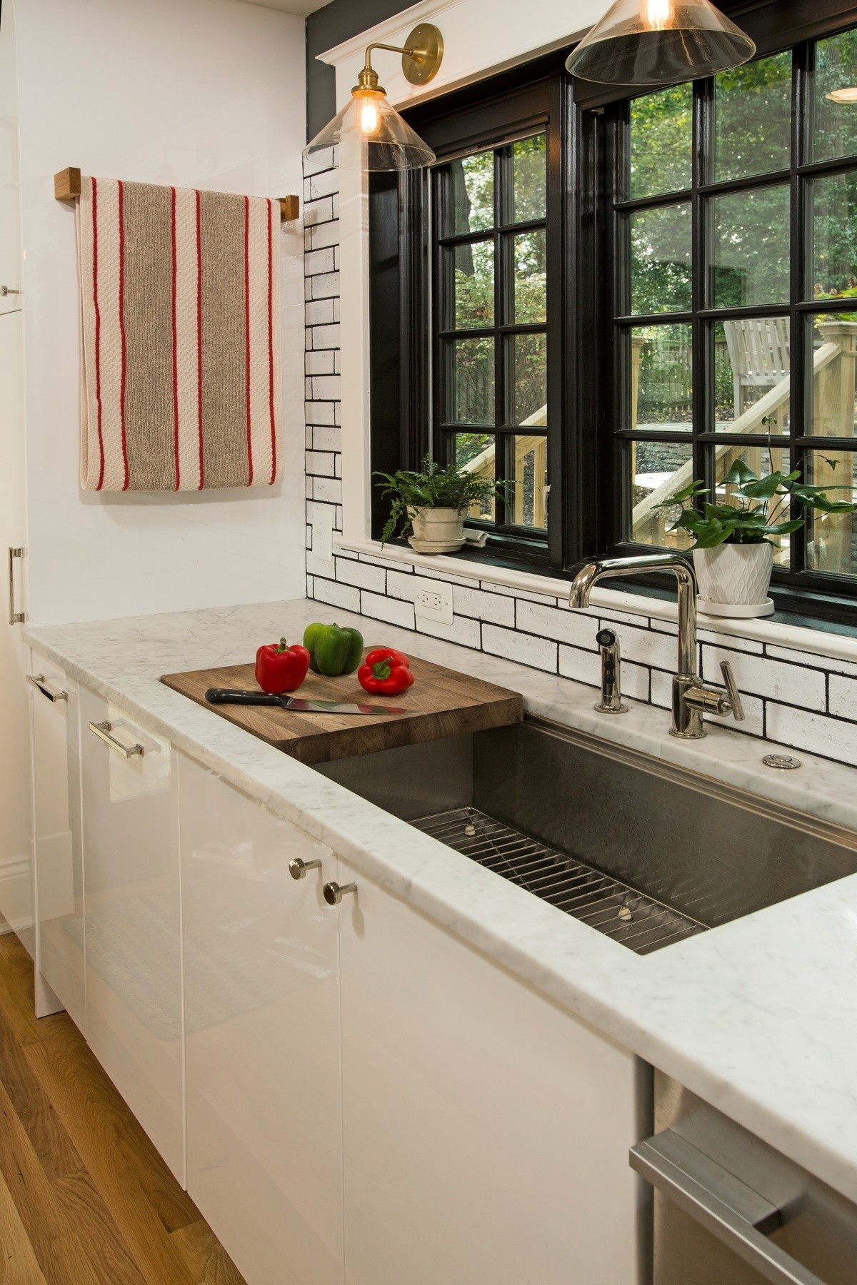 View of expanded kitchen space showing streamlined layout and increased functionality from modest rear addition