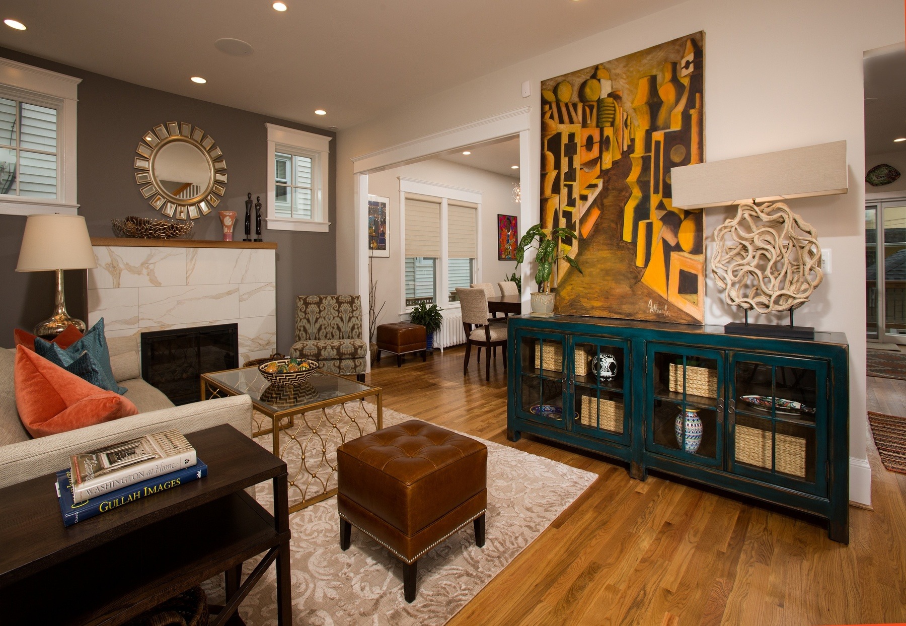 Sophisticated living space in Shepherd Park home featuring contemporary design with colorful accents reflecting graphic artist owner's personal style