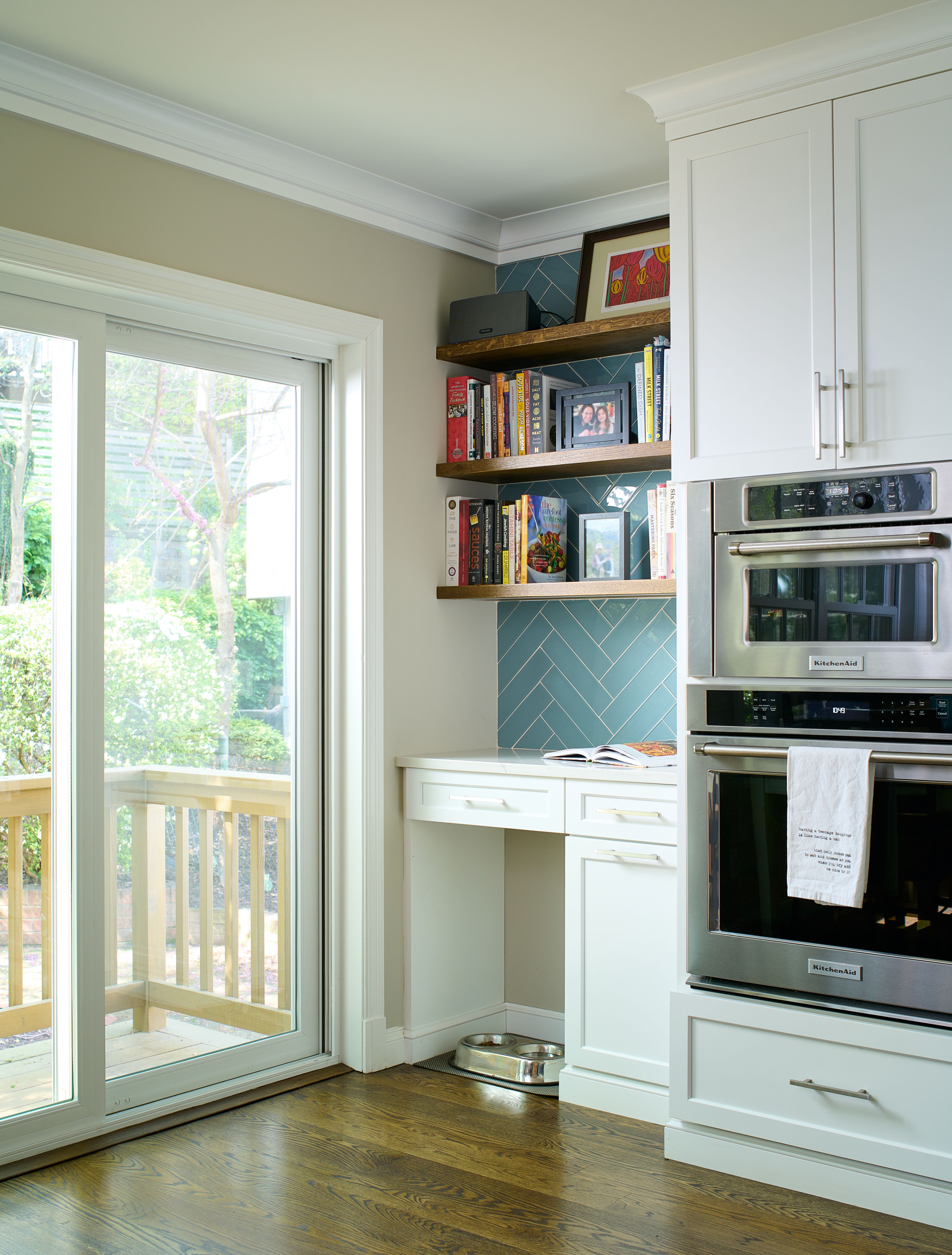 Dining area with abundant natural light, contemporary fixtures, and seamless flow to kitchen in Crestwood home