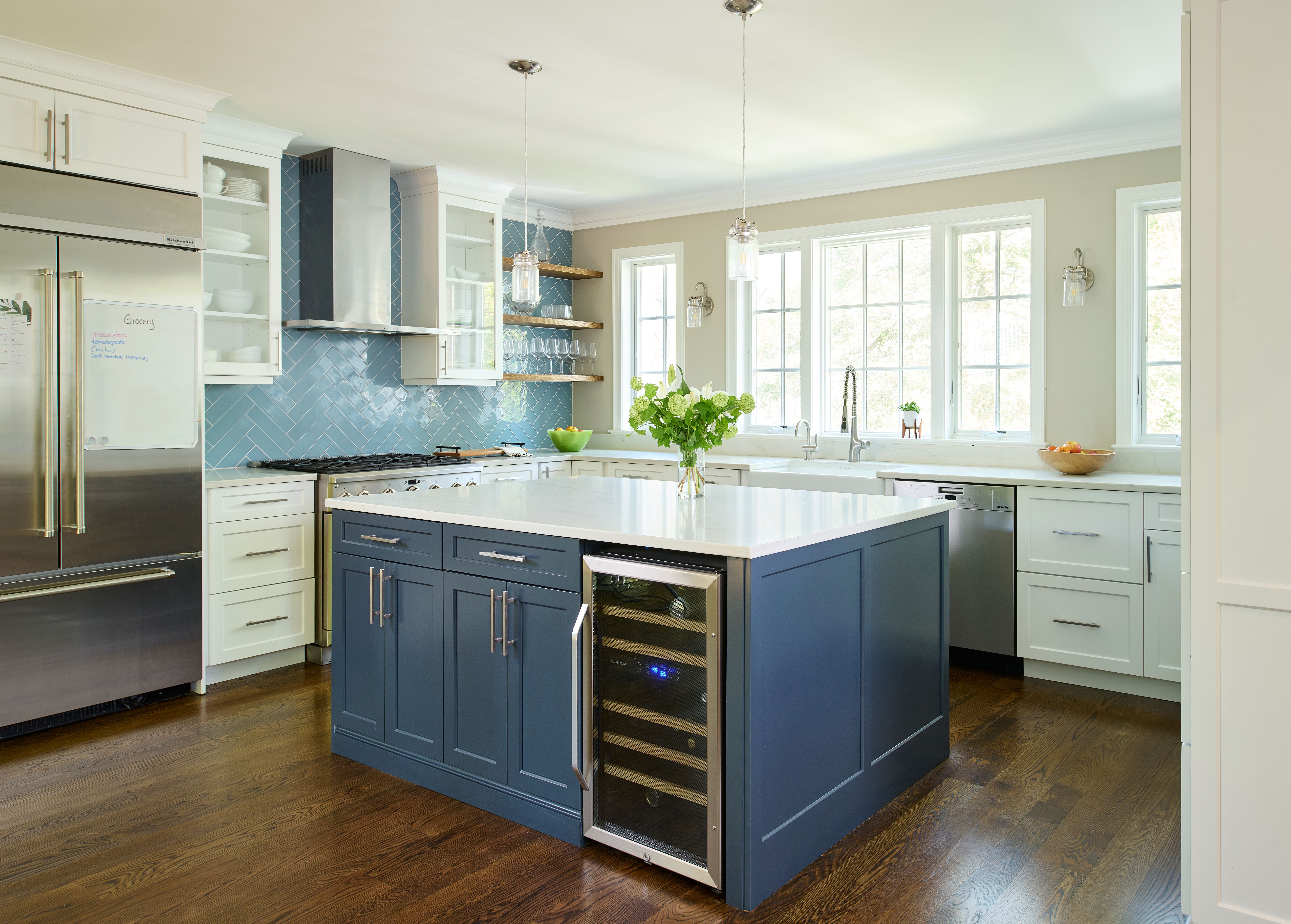 Kitchen with custom cabinetry, premium appliances, and thoughtful design elements in expanded Crestwood DC home