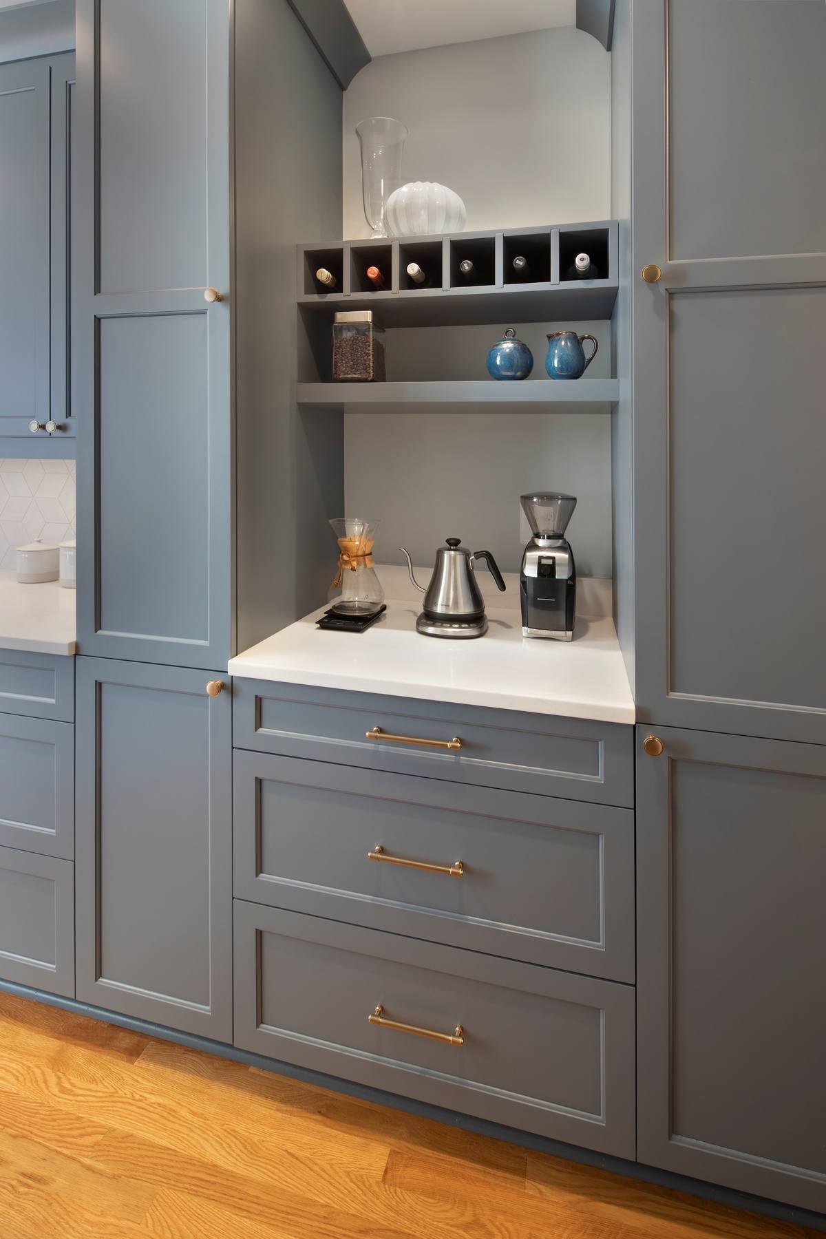 Detail of kitchen featuring stainless steel appliances, contemporary fixtures, and careful attention to design elements
