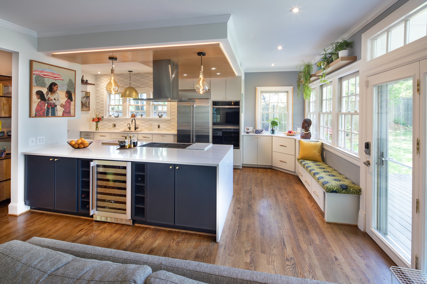 Open concept design showcasing flow between updated kitchen and newly built family room addition