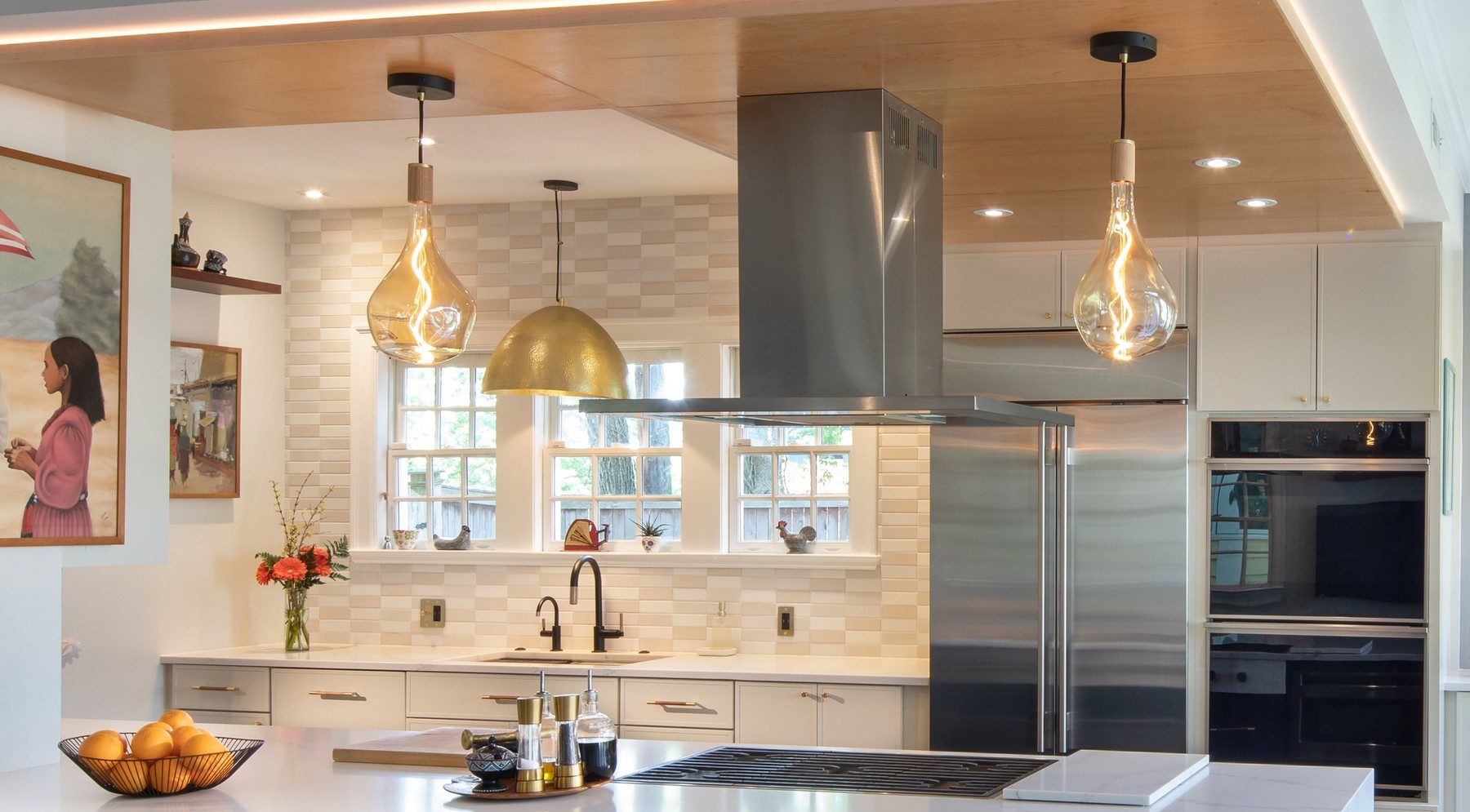 Family room addition with comfortable seating and seamless connection to renovated kitchen space