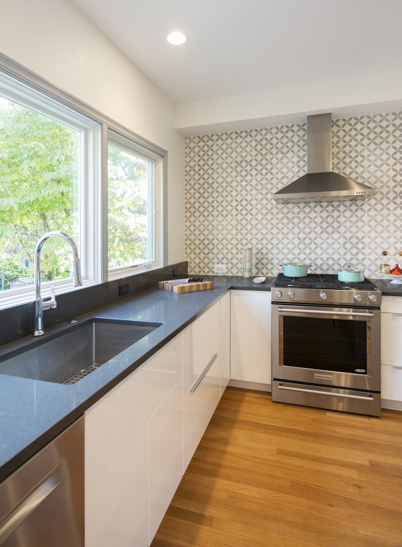 Breakfast nook area with comfortable seating and connection to optimized kitchen space in semi-detached DC home