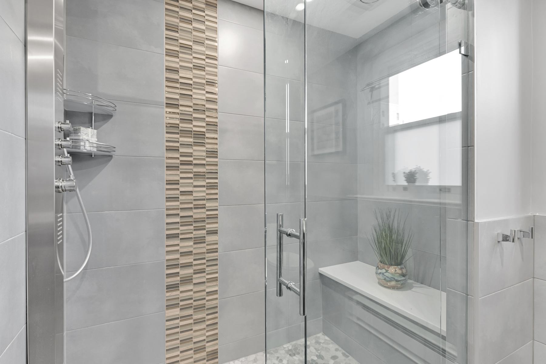 Bathroom vanity showcasing custom cabinetry, designer sink, and refined details in renovated apartment