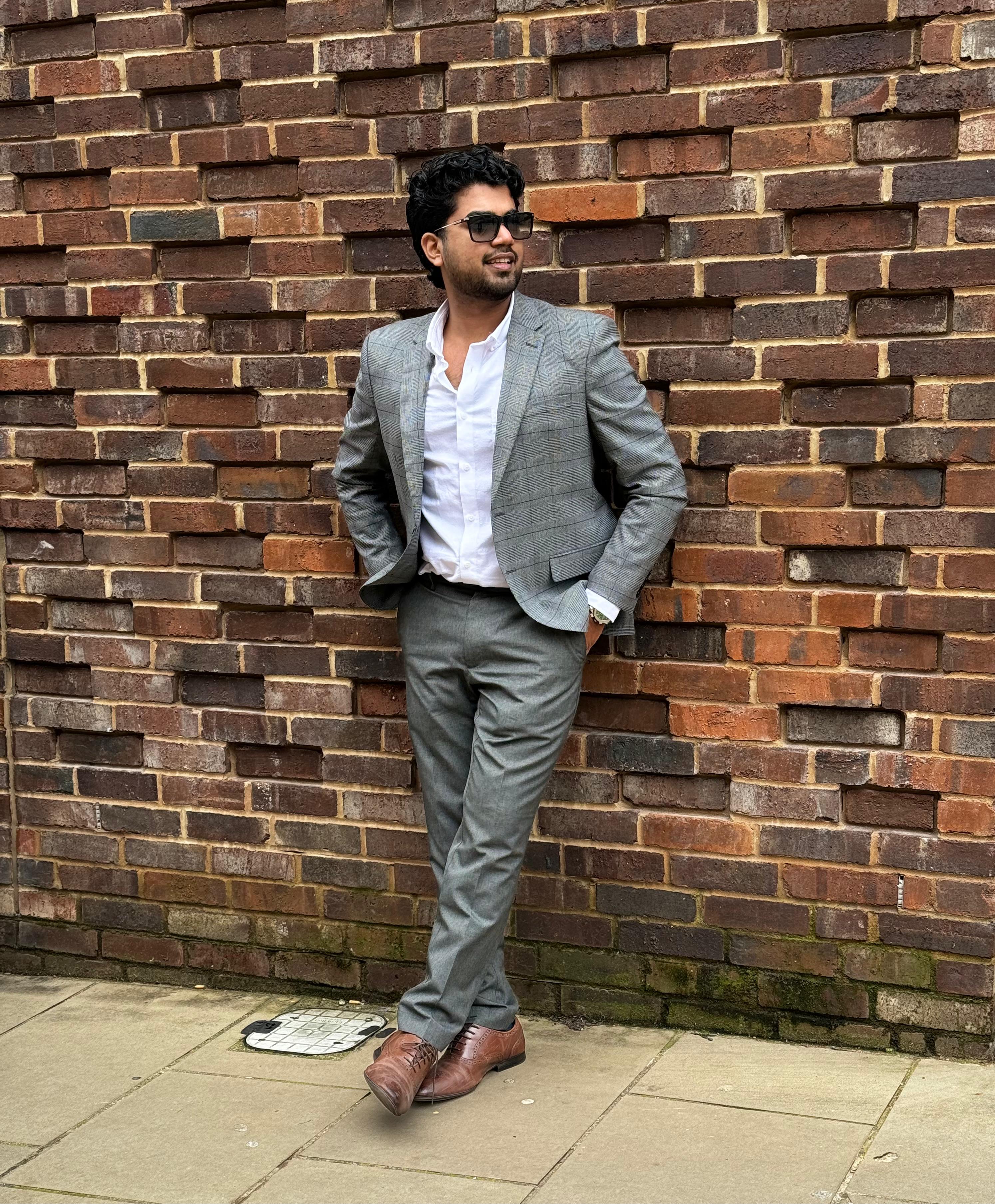 [headshot] image of satisfied customer shaking hands with company representative (for a fintech company)