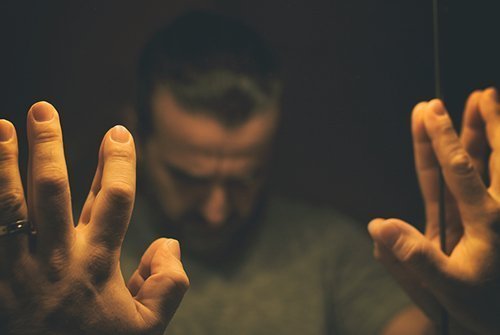Man dealing with stigma of addiction
