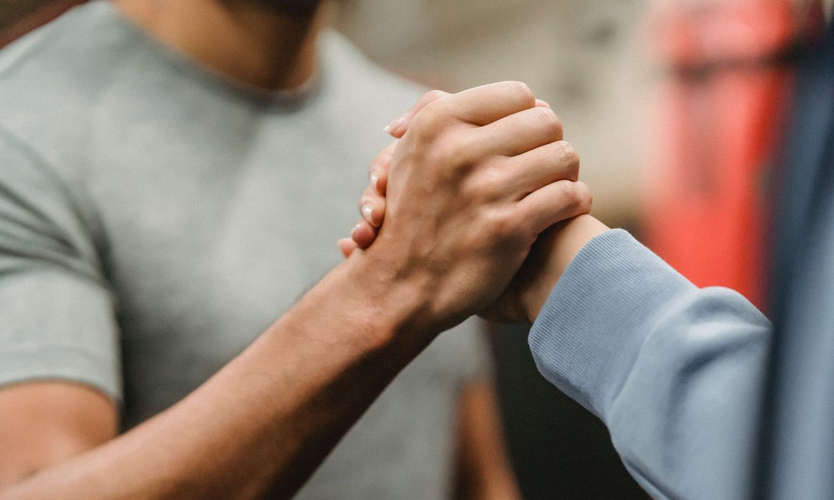 Friends helping each other through addiction recovery