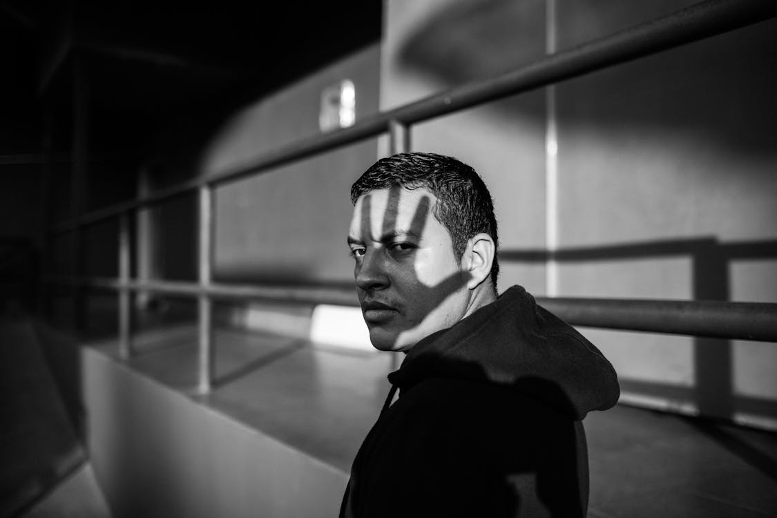 Free Monochrome Photo of Man Wearing Hoodie Stock Photo