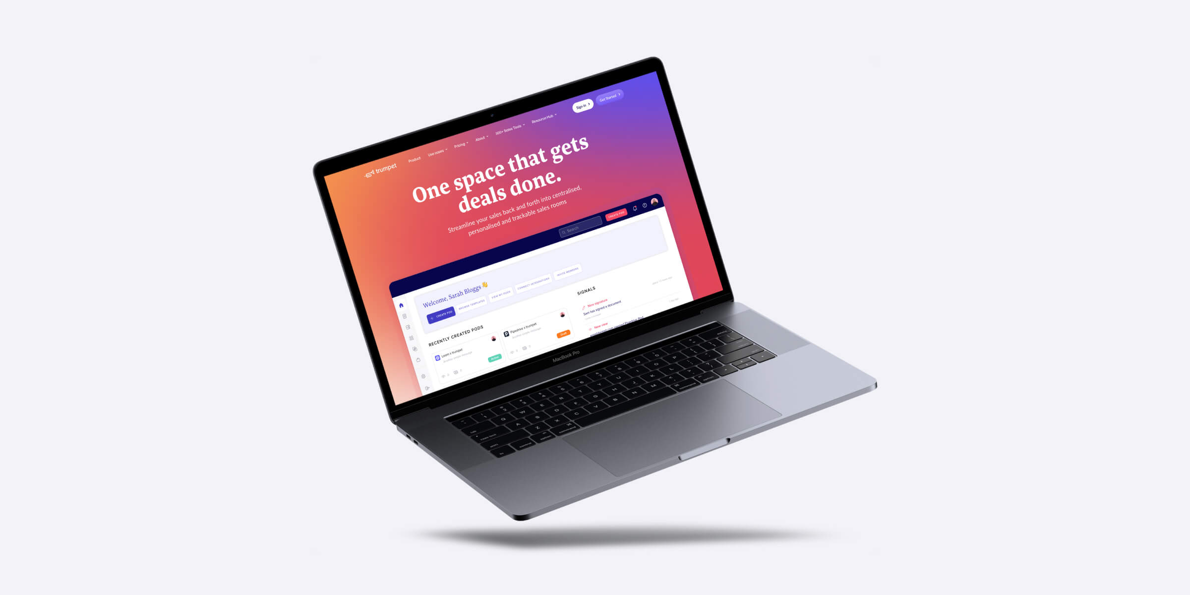 Macbook on the table with the trumpet website opened, presented as mockup