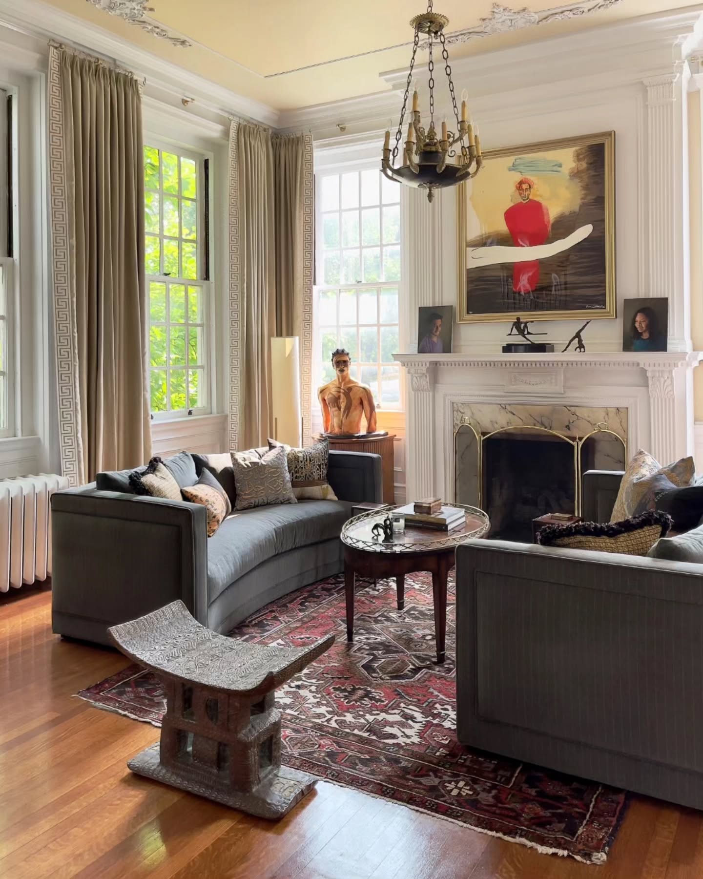 Living room with warm textures, natural light, and curated interior styling.