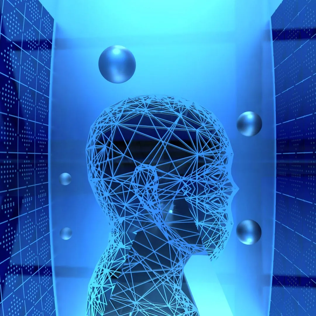 Blue wireframe human head side view with floating metallic spheres and digital panels background.
