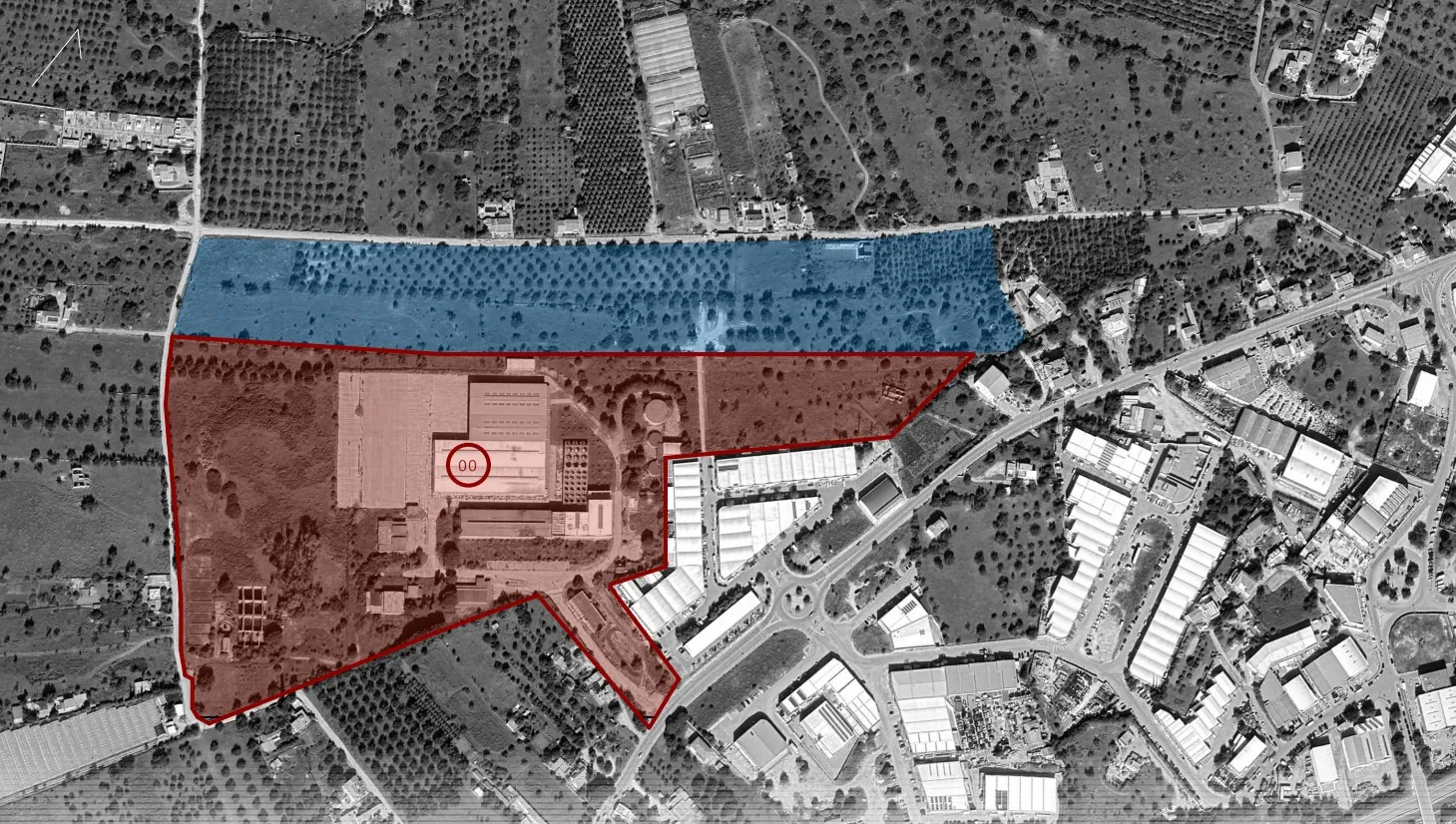 Aerial view of industrial and agricultural zones with two differently colored boundary areas, red and blue.