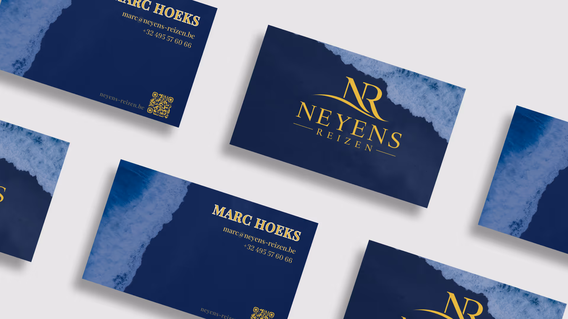 Blue business cards with ocean wave design, featuring gold text for Neyens Reizen and contact details for Marc Hoeks.