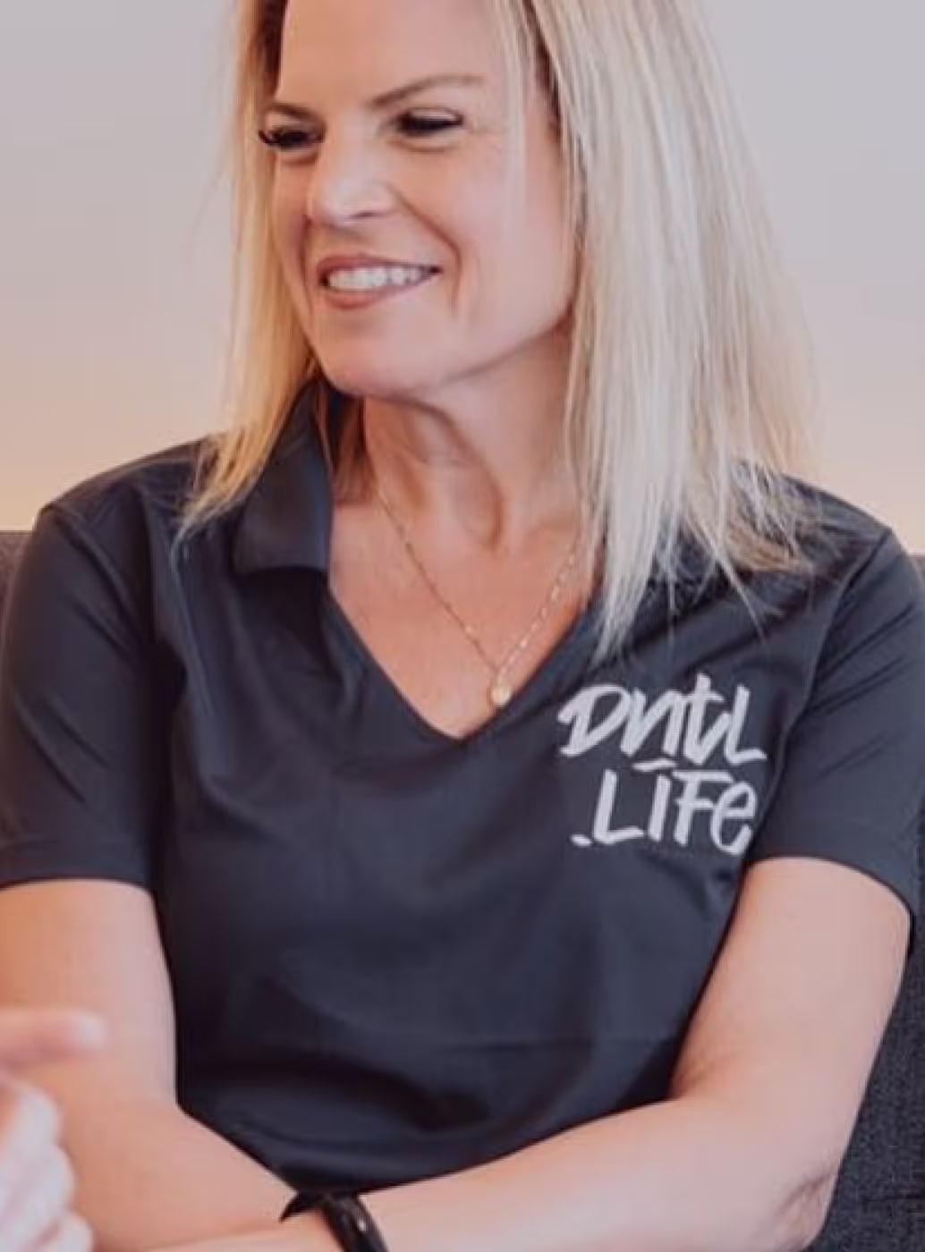 A woman smiling
