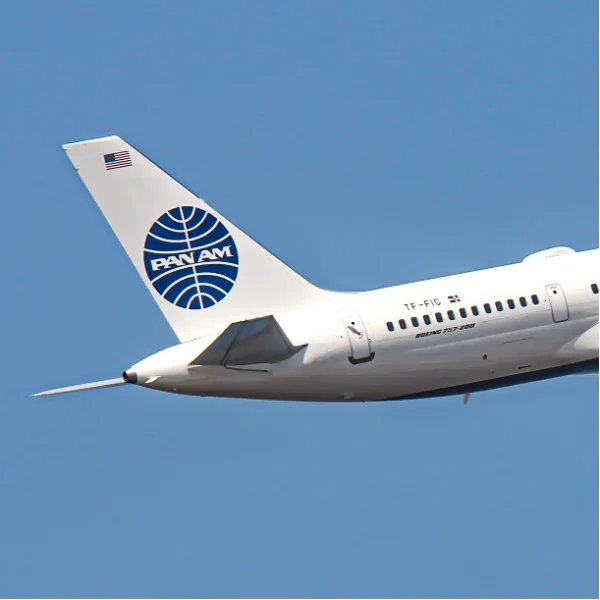 Instagram Post: Pan Am jet in flight against a clear blue sky.