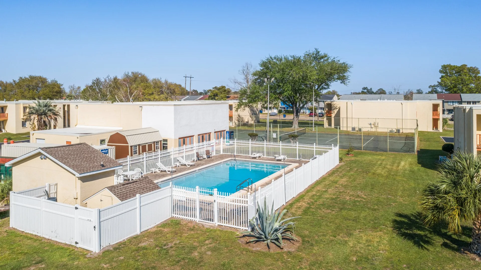 Community pool and outdoor amenities at Aztec Villa