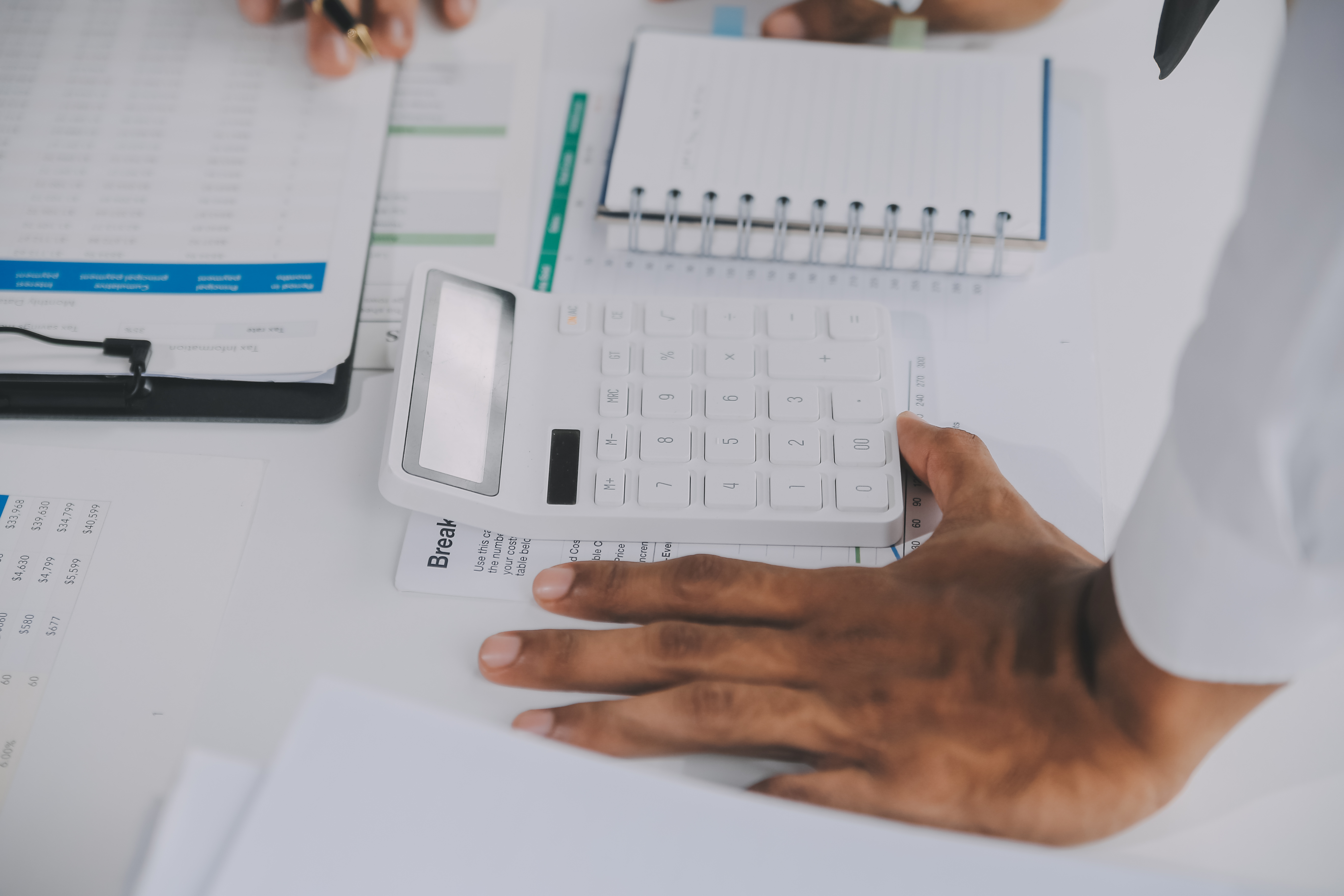 Analyst reviewing AI-assisted prospecting data on charts
