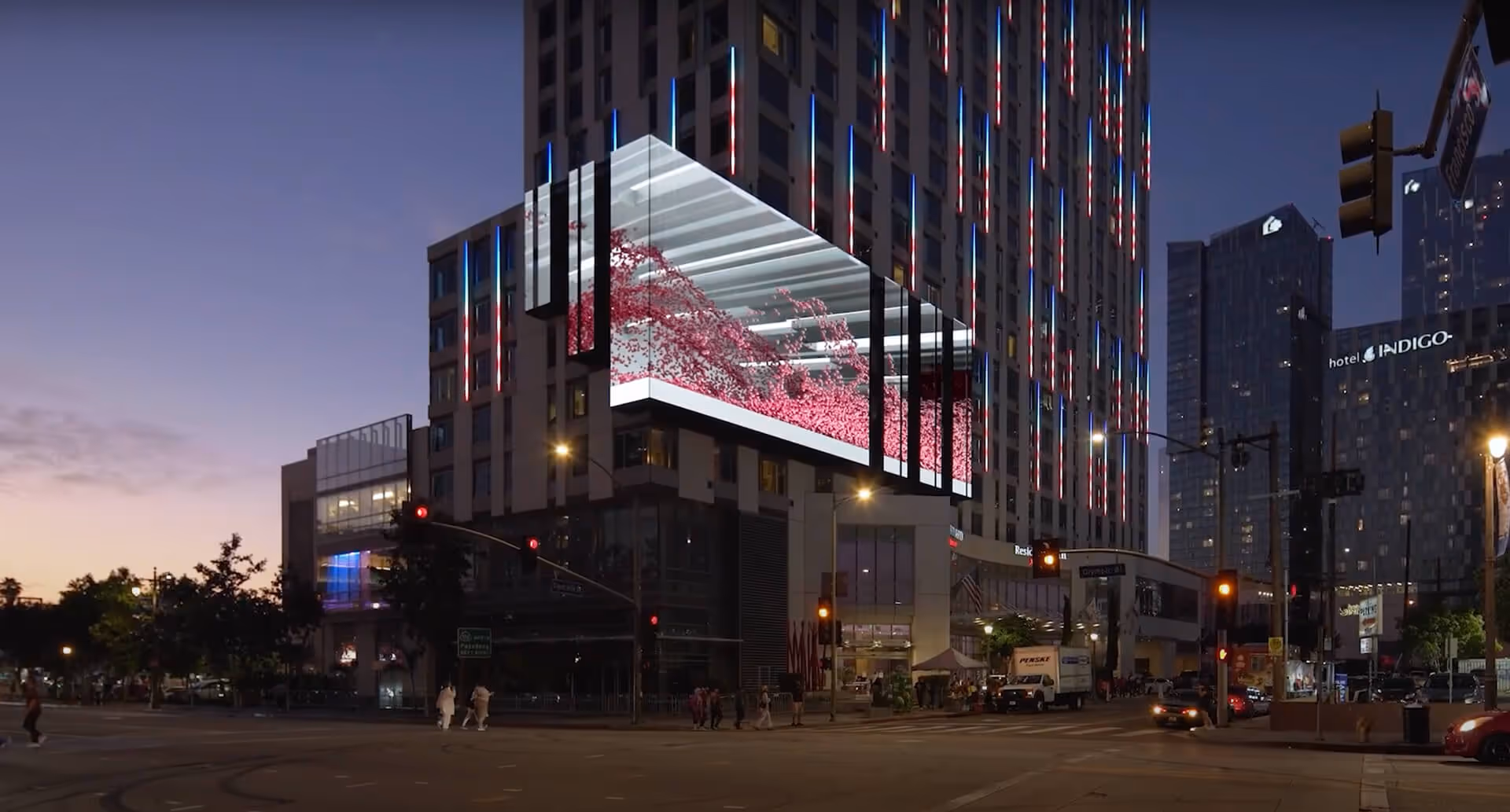 Wide-angle view of the anamorphic 3D billboard in downtown LA, showcasing the logo appearing to extend beyond the screen.