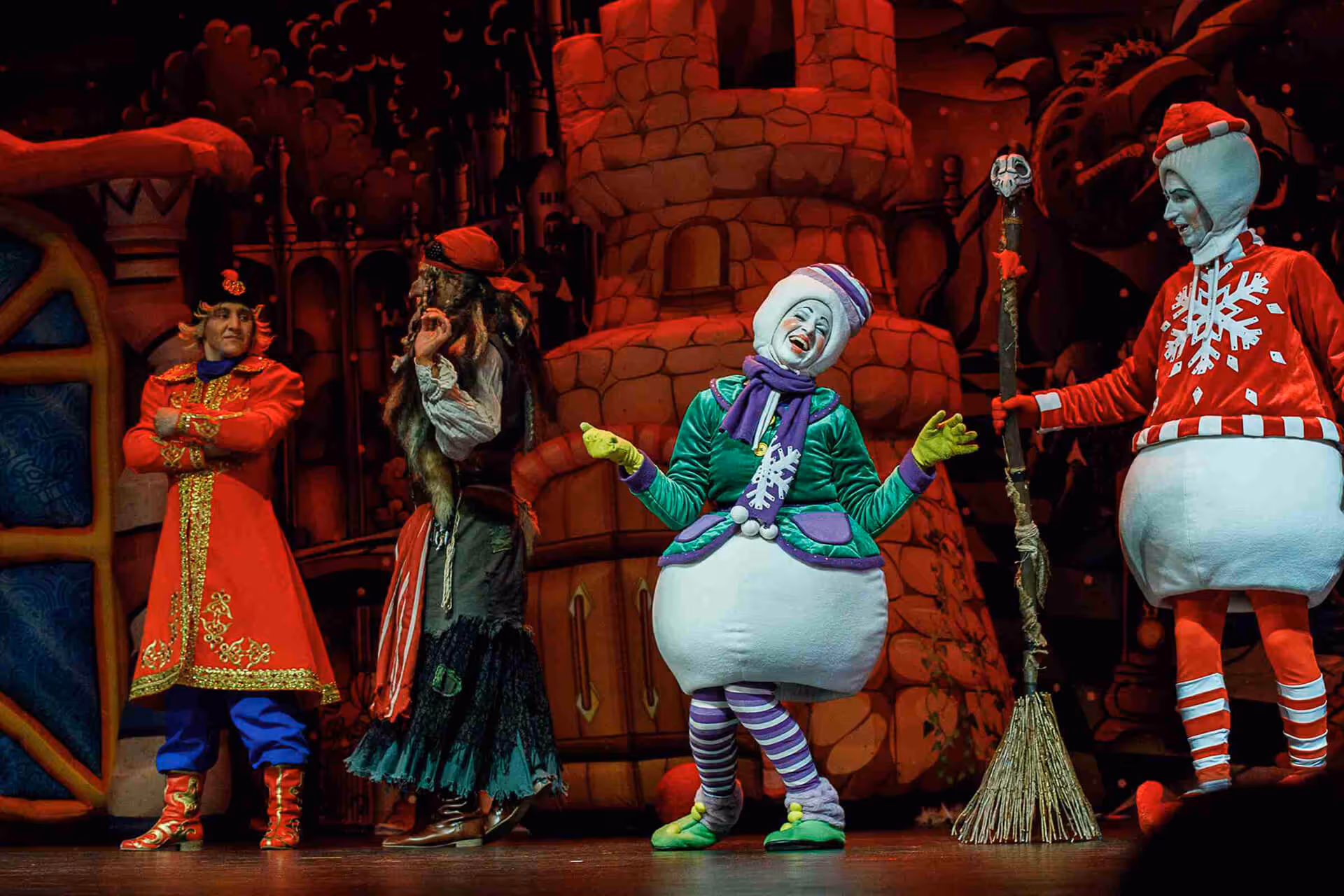 Actors on stage with decorations performing for children as part of the New Year show