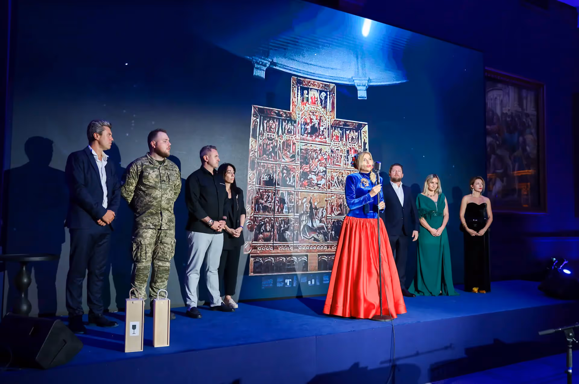Announcement and awarding of winners at charity auction