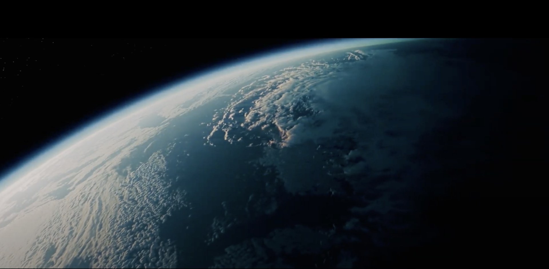 Curve of the Earth with clouds at dawn seen from orbit