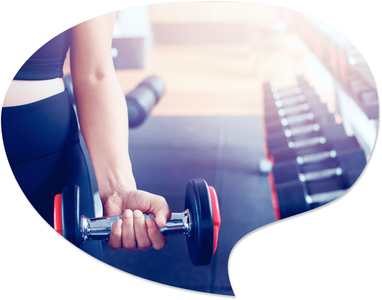 A woman holds weights