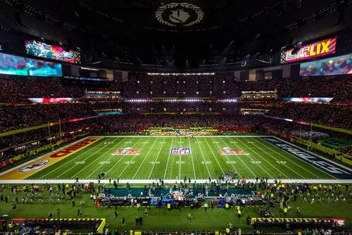Super Bowl LIX stadium view with packed stands and NFL football field