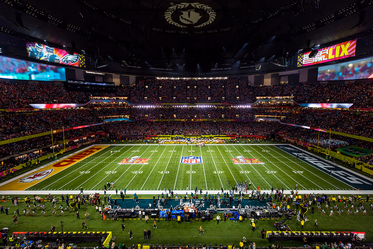 Super Bowl LIX stadium view with packed stands and NFL football field