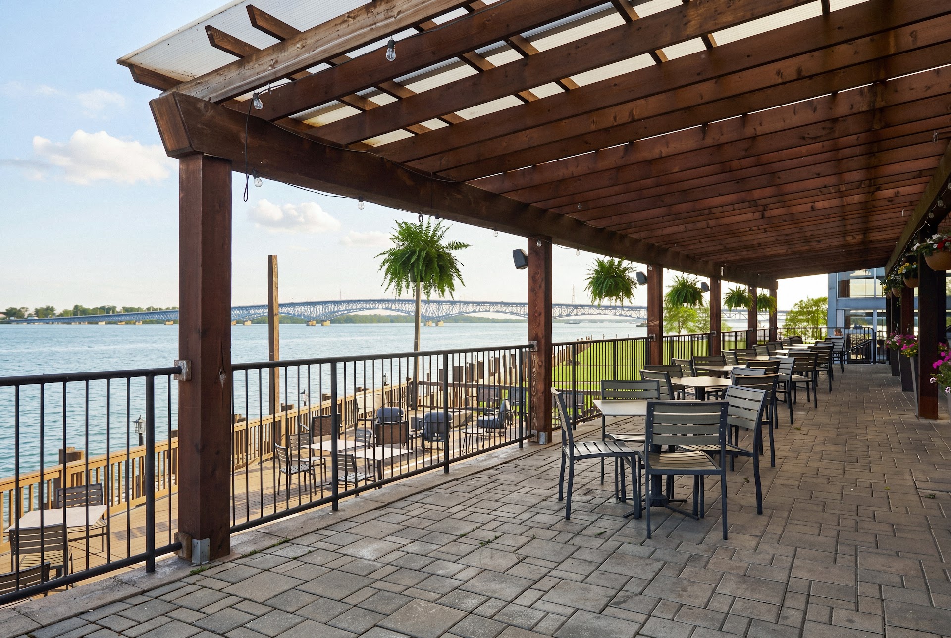 Bella Vista patio tables at the water's edge, the asset the season depends on
