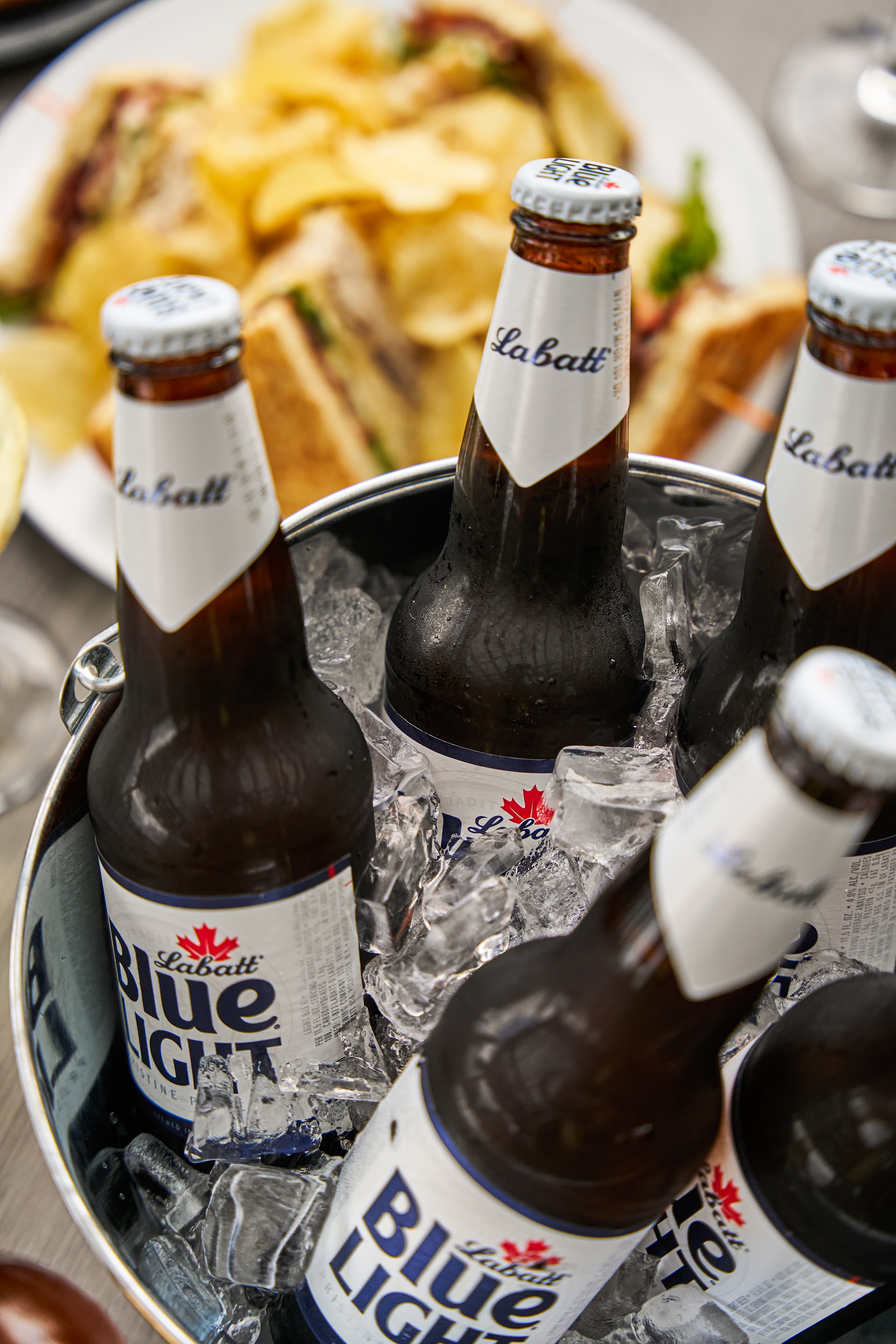 A bucket of Labatt Blue Light on ice, part of Bella Vista's patio offer lineup