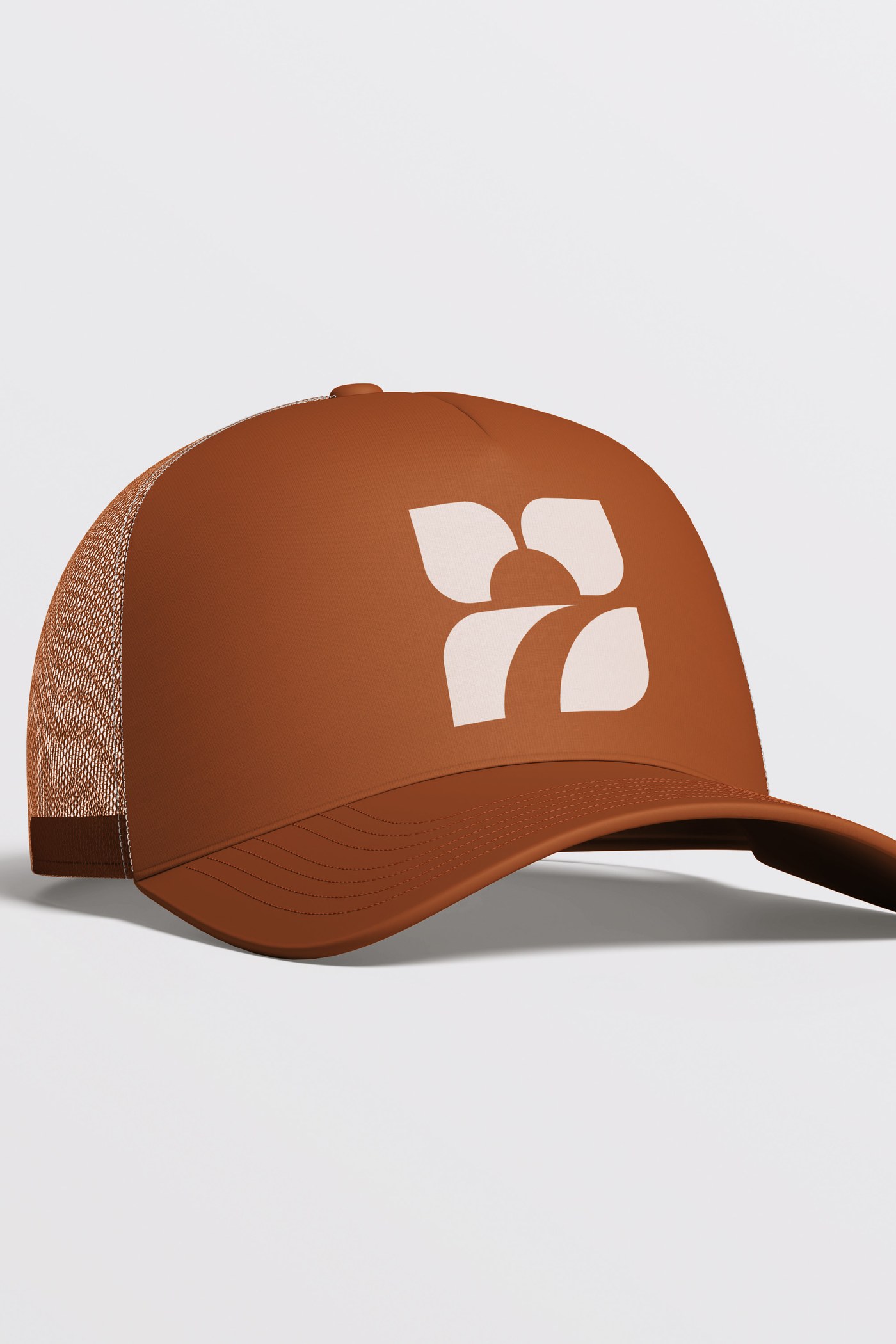 Clay-coloured cap with the Clayfield Commons Pathway logomark