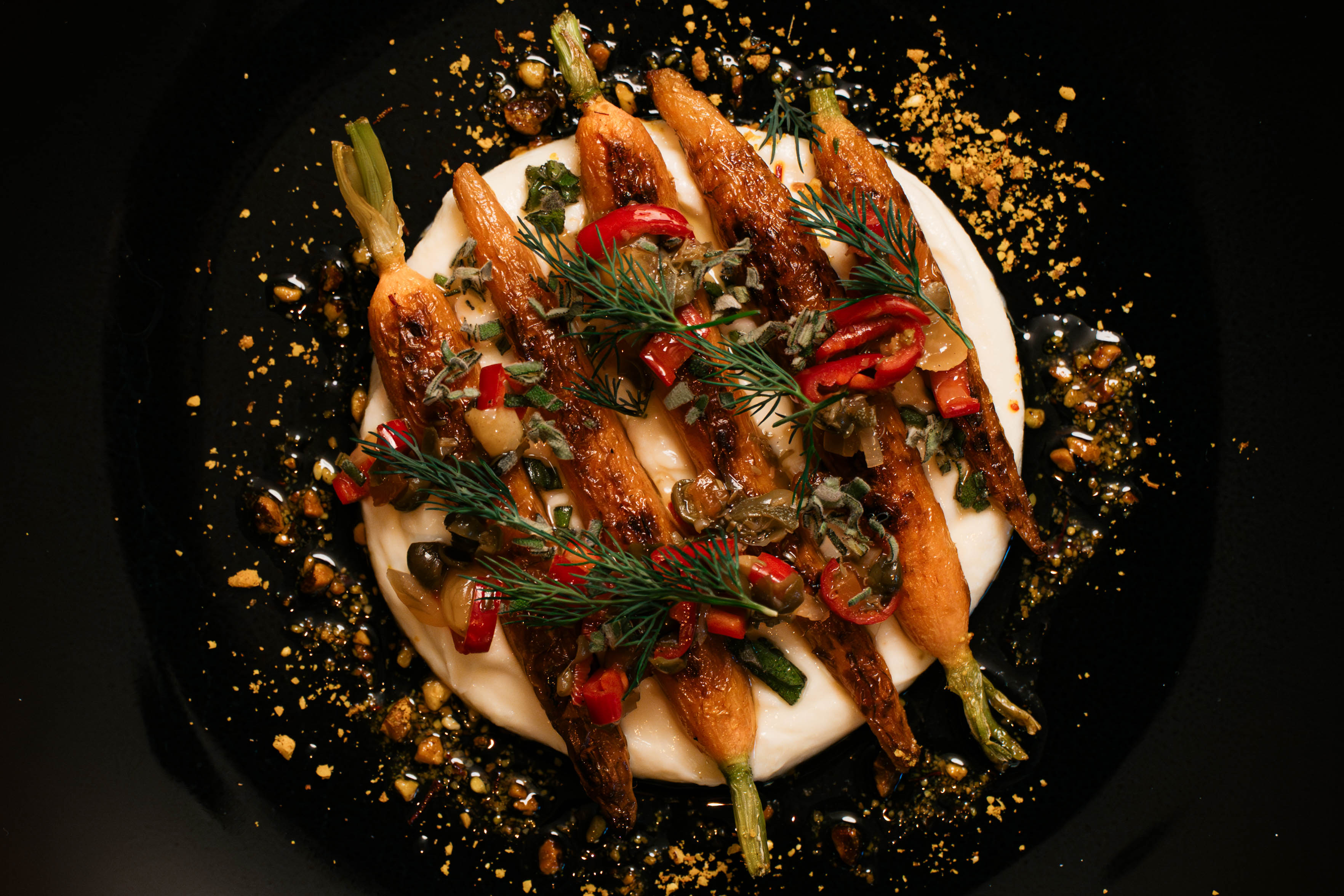Roasted heirloom carrots on white puree at AG Inspired Cuisine in Niagara Falls