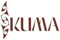 A logo for the word "IKUMA". The first letter, "I", is stylized as a long, brown, vertical shape with two curving, spiral-like patterns on its left side, resembling a hook or a tribal design. The rest of the letters, "KUMA", are in a simple, brown sans-serif font.